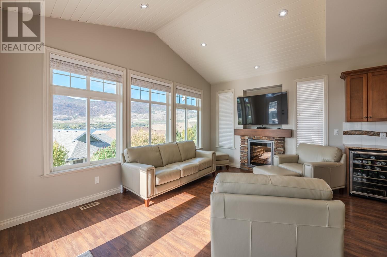 2450 Radio Tower Road Unit# 206, Oliver, BC - Indoor Photo Showing Living Room With Fireplace