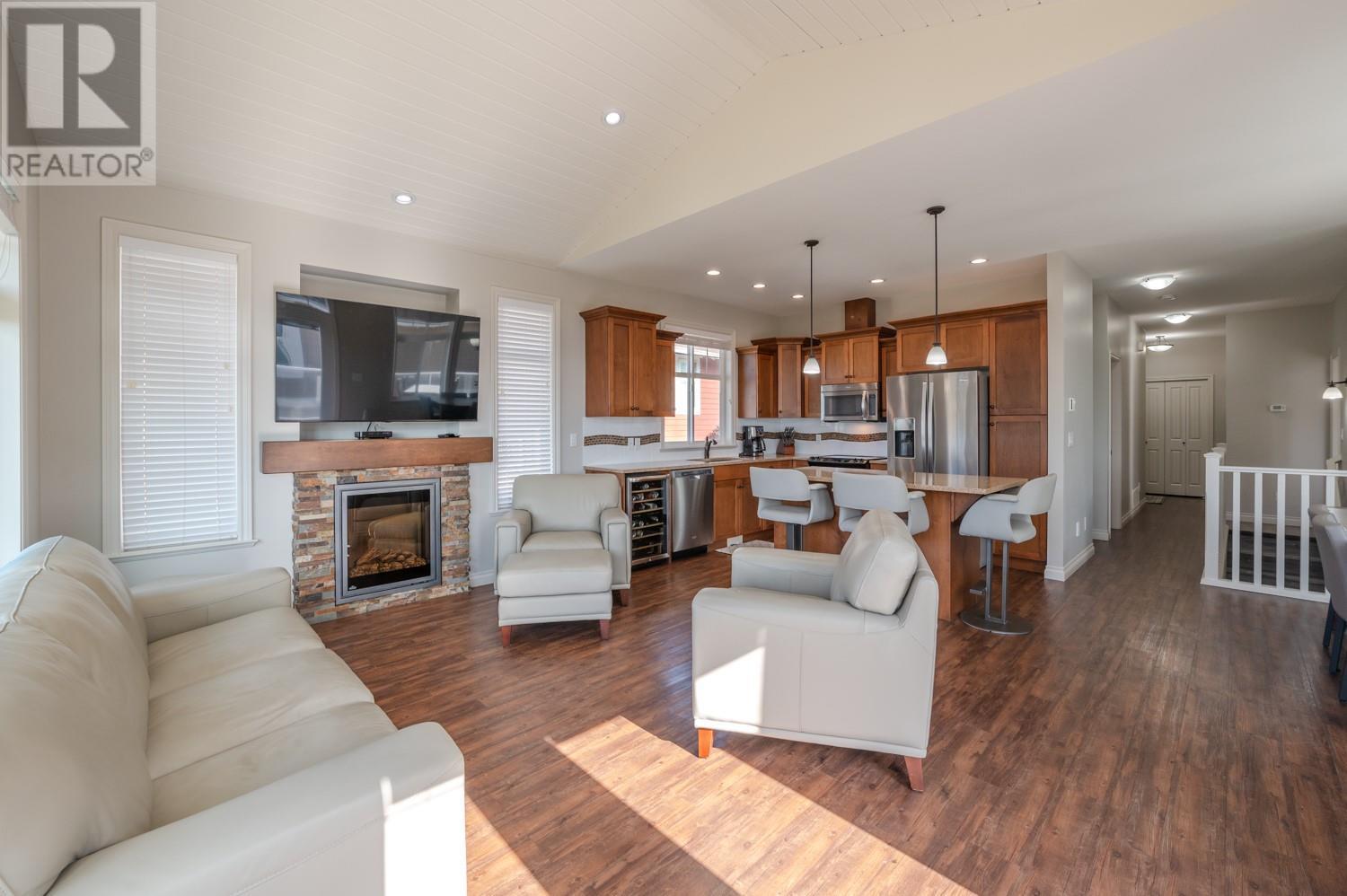 2450 Radio Tower Road Unit# 206, Oliver, BC - Indoor Photo Showing Living Room With Fireplace