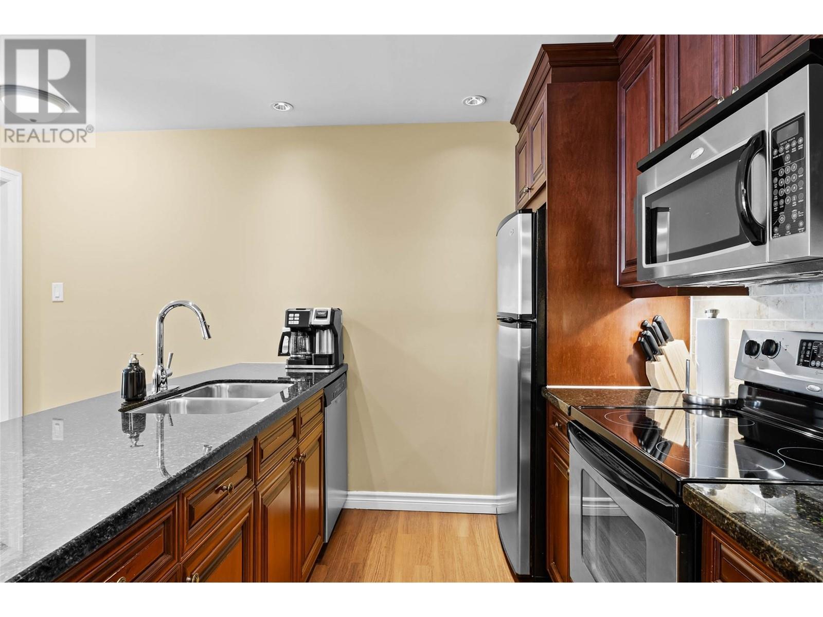 3250 Village Way Unit# 1201Abcd, Sun Peaks, BC - Indoor Photo Showing Kitchen With Stainless Steel Kitchen With Double Sink With Upgraded Kitchen