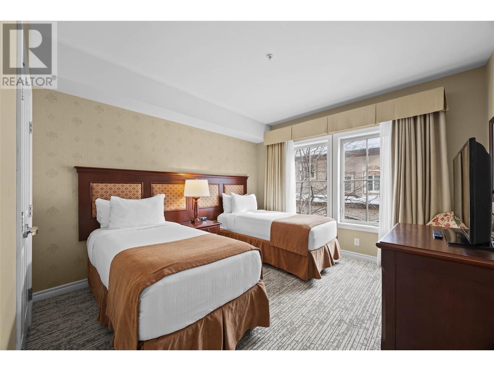 3250 Village Way Unit# 1201Abcd, Sun Peaks, BC - Indoor Photo Showing Bedroom