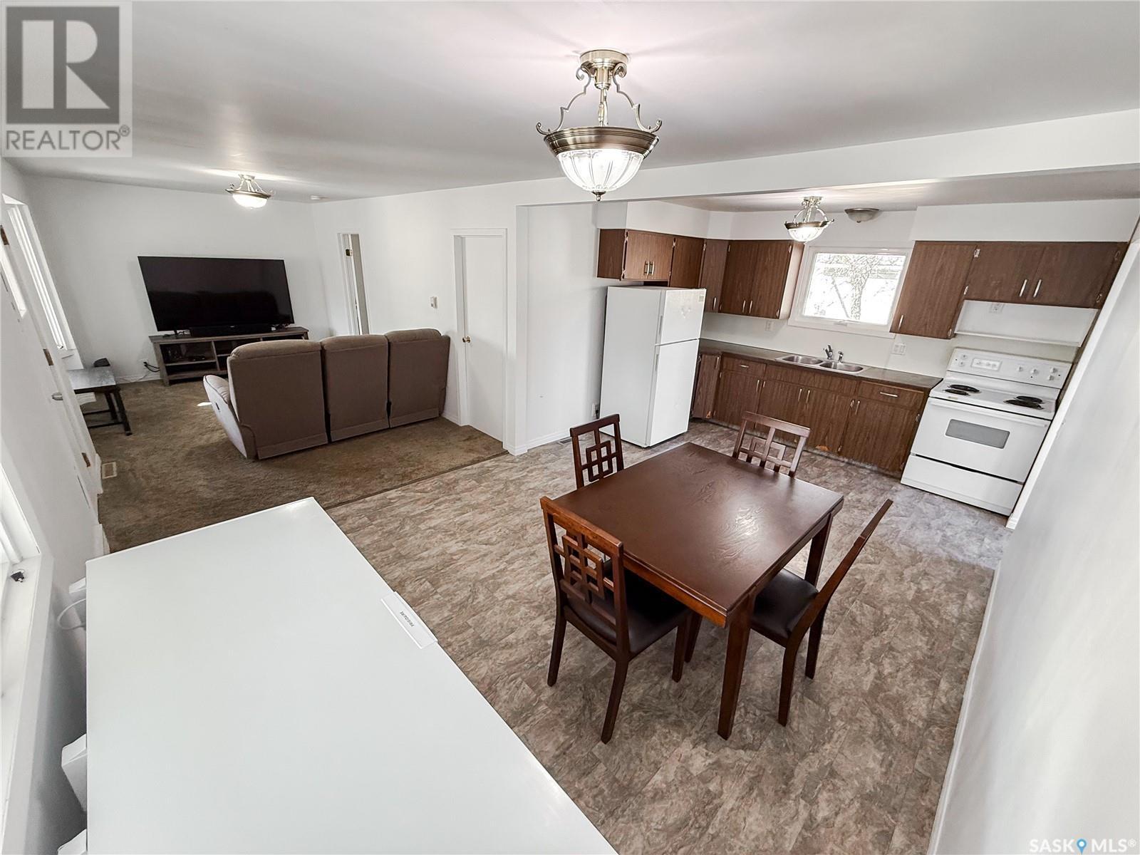 106 1St Street, Gull Lake, SK - Indoor Photo Showing Kitchen With Double Sink
