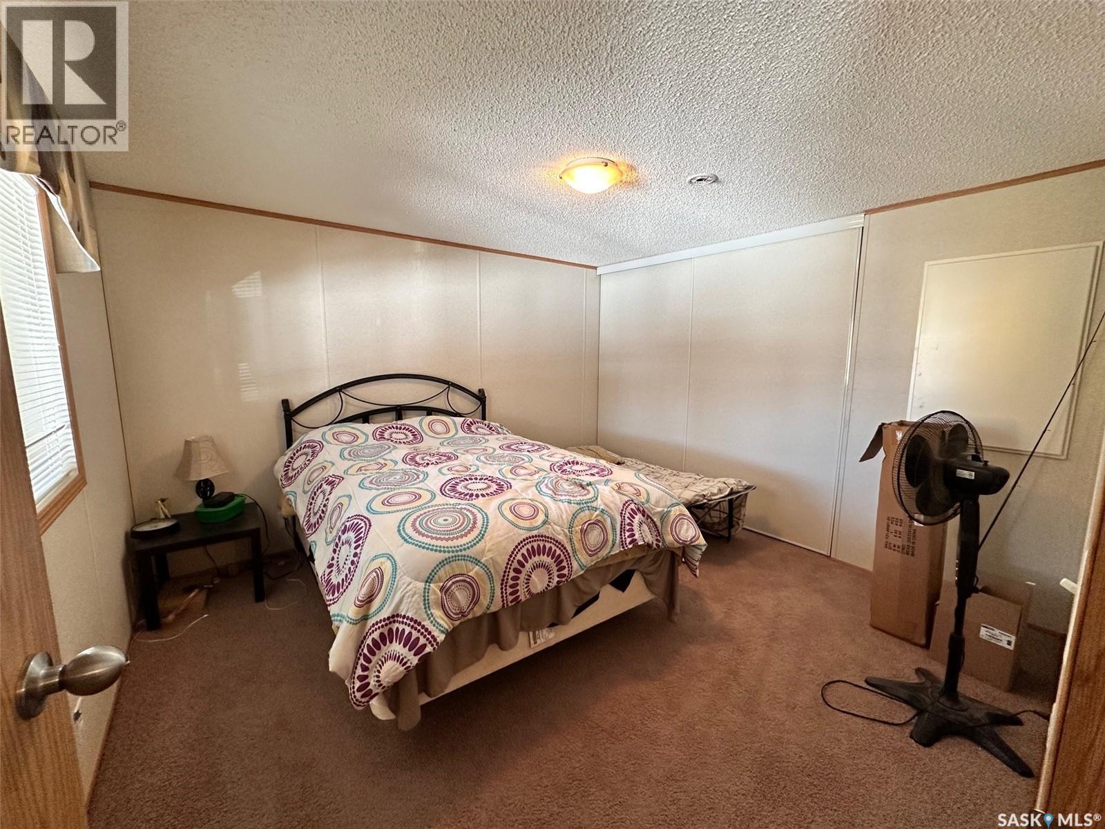 103 5Th Avenue, Chitek Lake, SK - Indoor Photo Showing Bedroom
