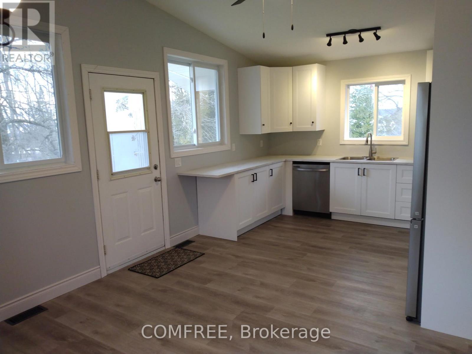 7177 Beach Drive, Ramara, ON - Indoor Photo Showing Kitchen With Double Sink
