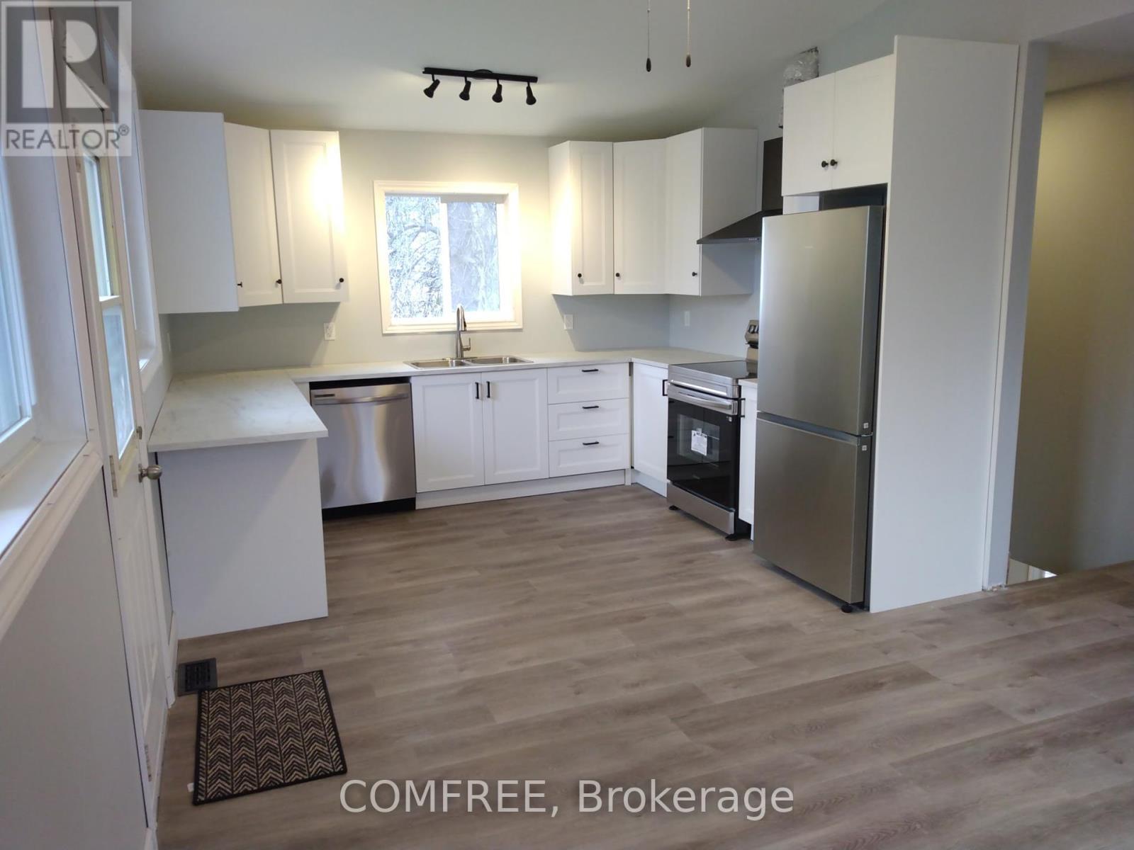 7177 Beach Drive, Ramara, ON - Indoor Photo Showing Kitchen With Double Sink