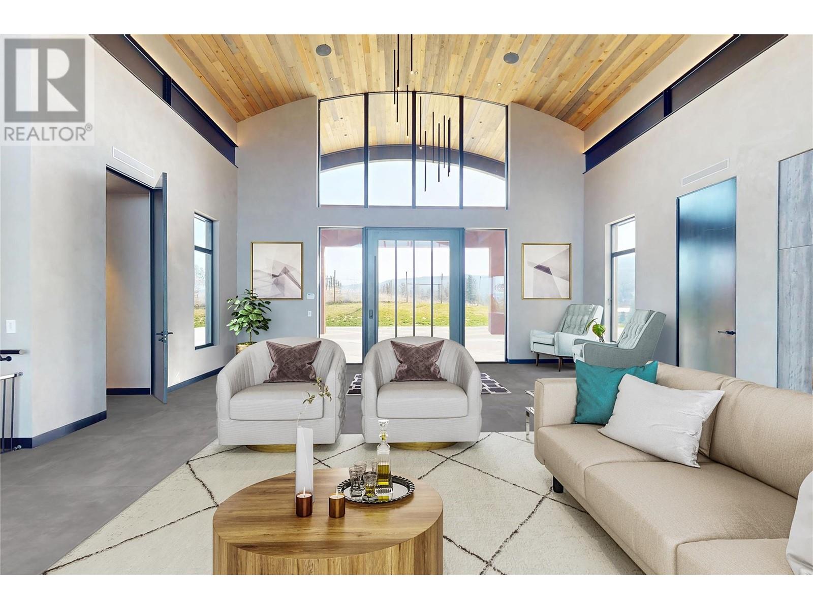 Photo has been virtually staged - 4275 Todd Road, Kelowna, BC - Indoor Photo Showing Living Room