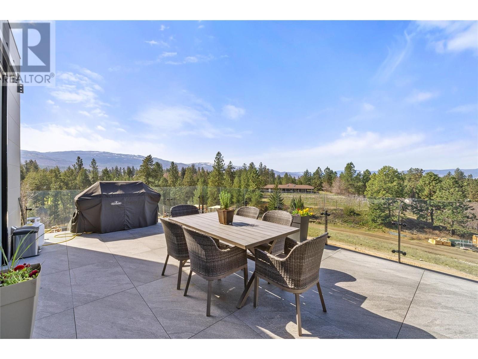 Stunning landscape views from over 700 sq ft of deck - 4275 Todd Road, Kelowna, BC - Outdoor With Deck Patio Veranda