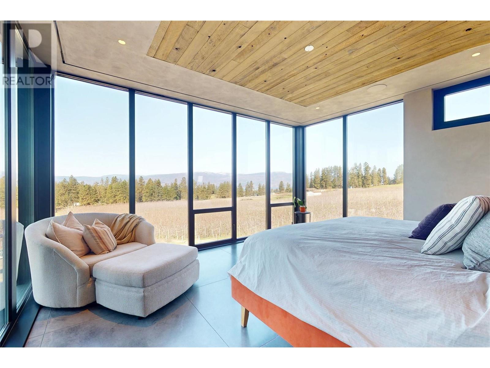 Gorgeous views from the primary suite - 4275 Todd Road, Kelowna, BC - Indoor Photo Showing Bedroom