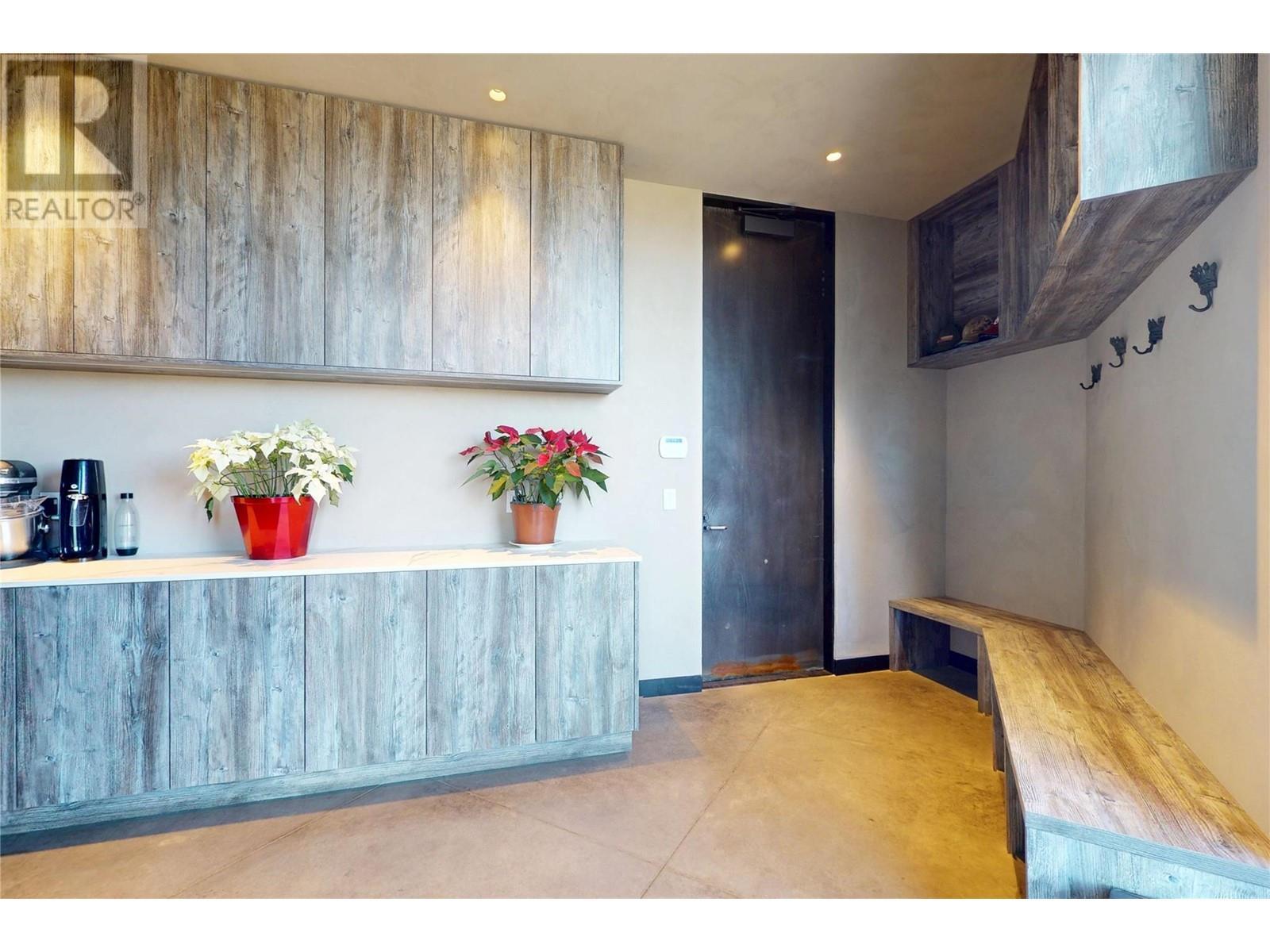 Laundry/mud room just off the kitchen - 4275 Todd Road, Kelowna, BC - Indoor Photo Showing Other Room