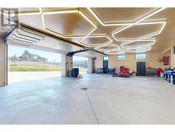4 car garage with 2 pc bath, amazing lighting and automatic windows -