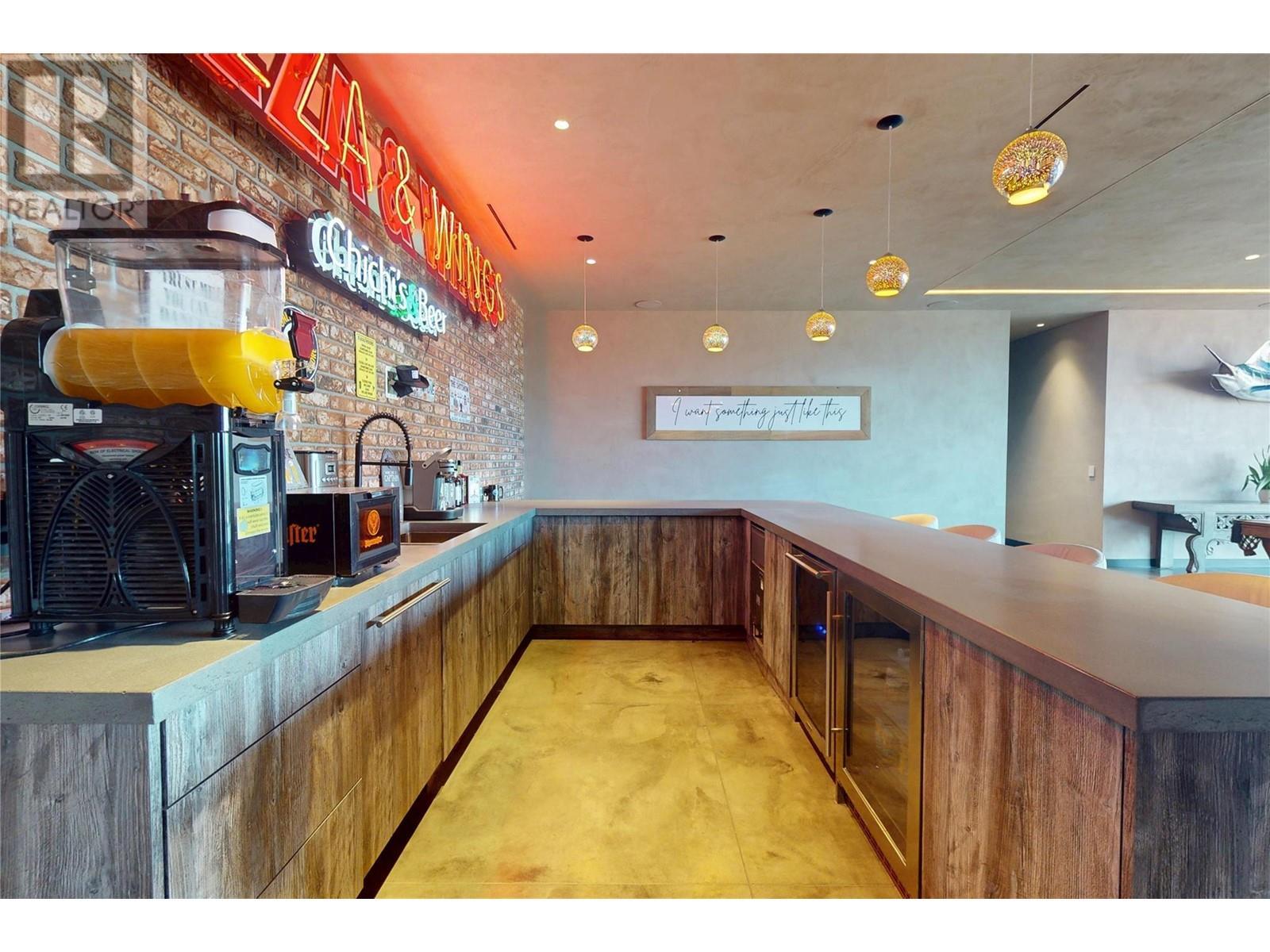 Dishwasher, cooler, ice maker and fridge - 4275 Todd Road, Kelowna, BC - Indoor Photo Showing Kitchen