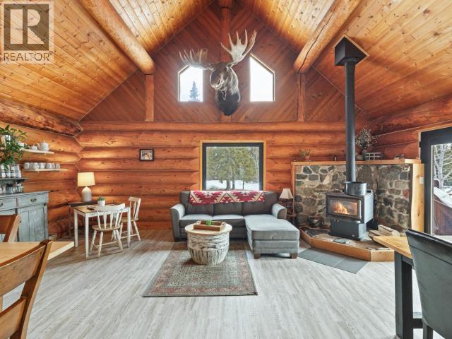 103084 Alaska Highway, Haines Junction, YT - Indoor Photo Showing Living Room With Fireplace