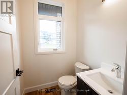 Bathroom at front Entry -