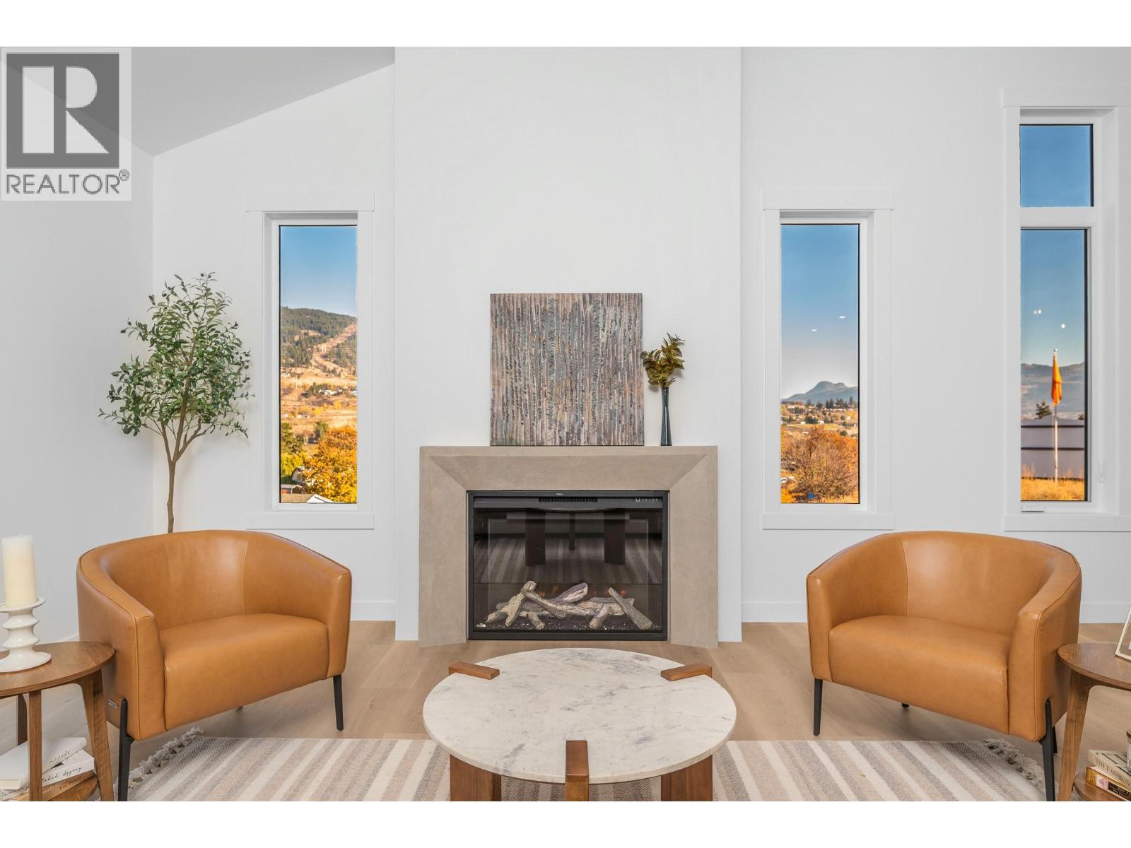 195 Sarsons Drive Lot# 10, Coldstream, BC - Indoor Photo Showing Living Room With Fireplace