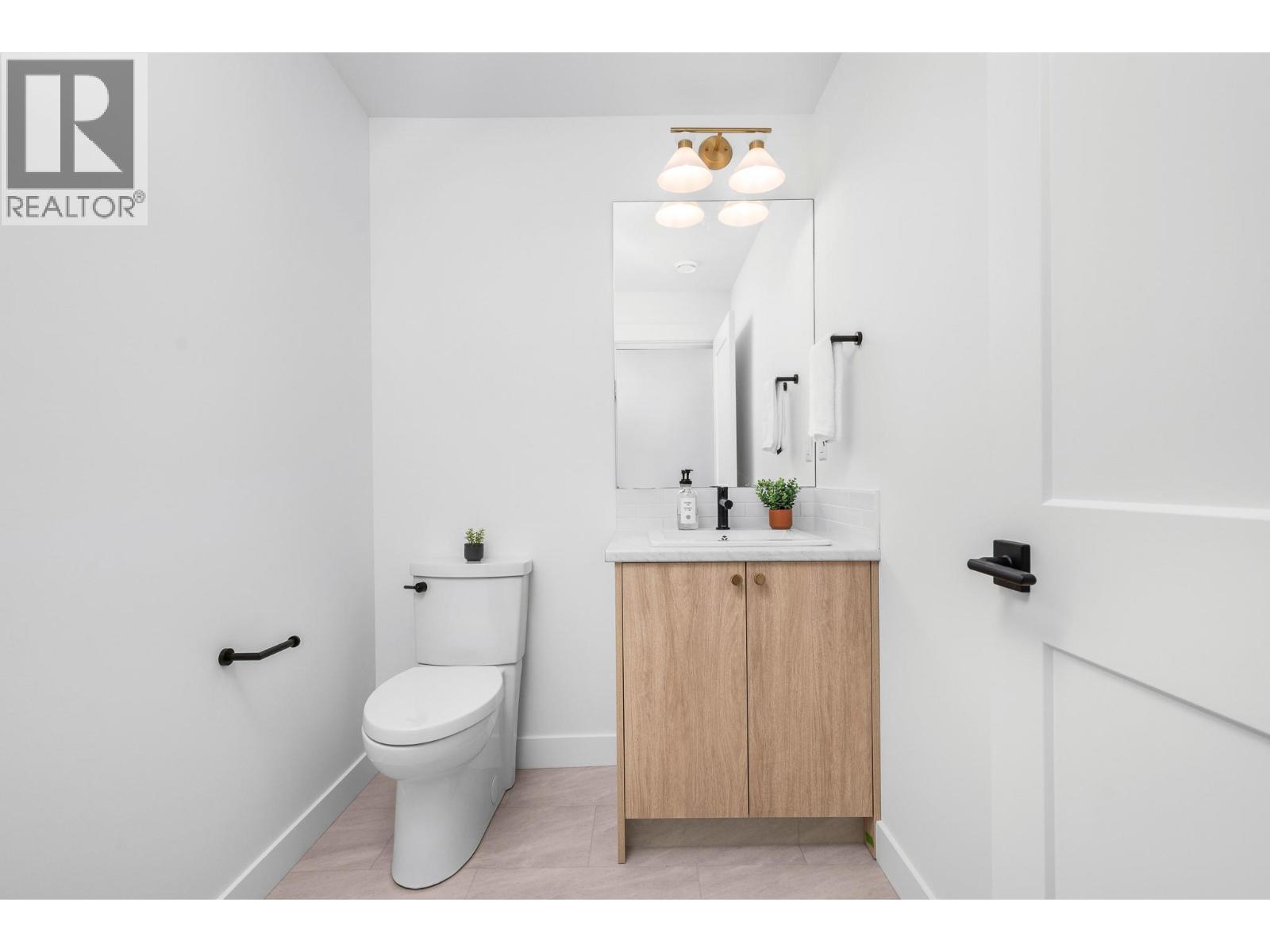 lower level 1/2 bath - 195 Sarsons Drive Lot# 10, Coldstream, BC - Indoor Photo Showing Bathroom