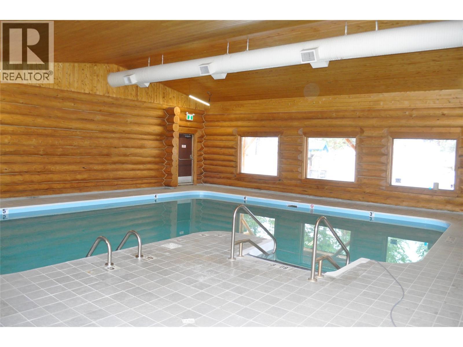 5485 Lac Le Jeune Road Unit# 25/26, Kamloops, BC - Indoor Photo Showing Other Room With In Ground Pool