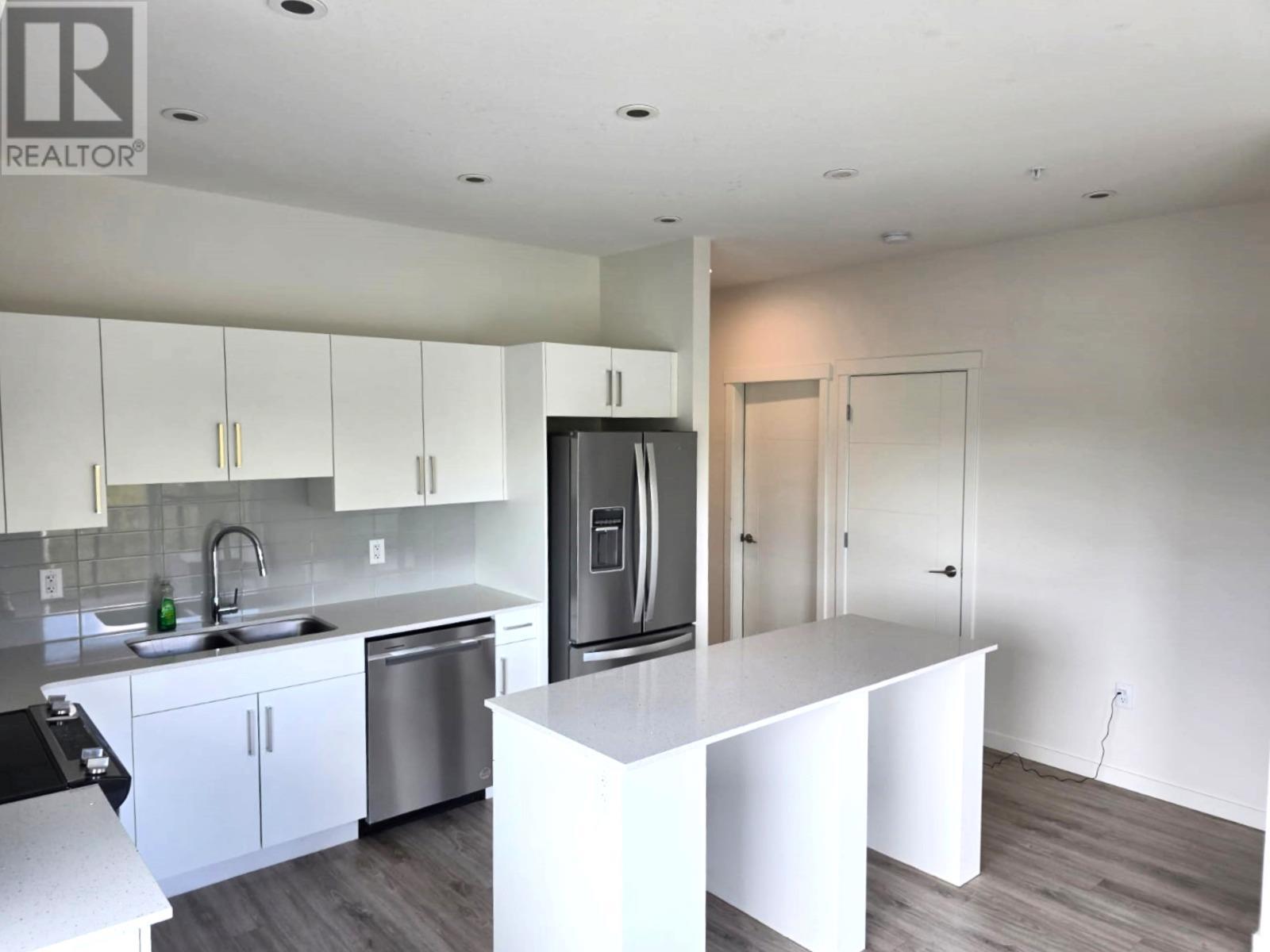 2345 Butt Road Unit# 414, Westbank, BC - Indoor Photo Showing Kitchen With Stainless Steel Kitchen With Double Sink