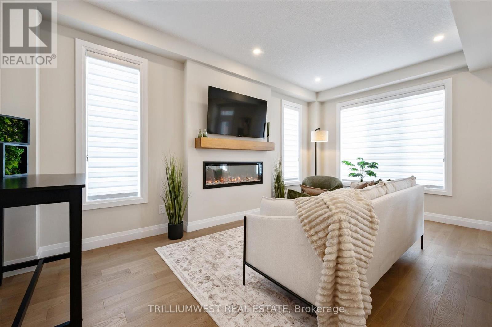 113 Catherine Street, Wilmot, ON - Indoor Photo Showing Living Room With Fireplace