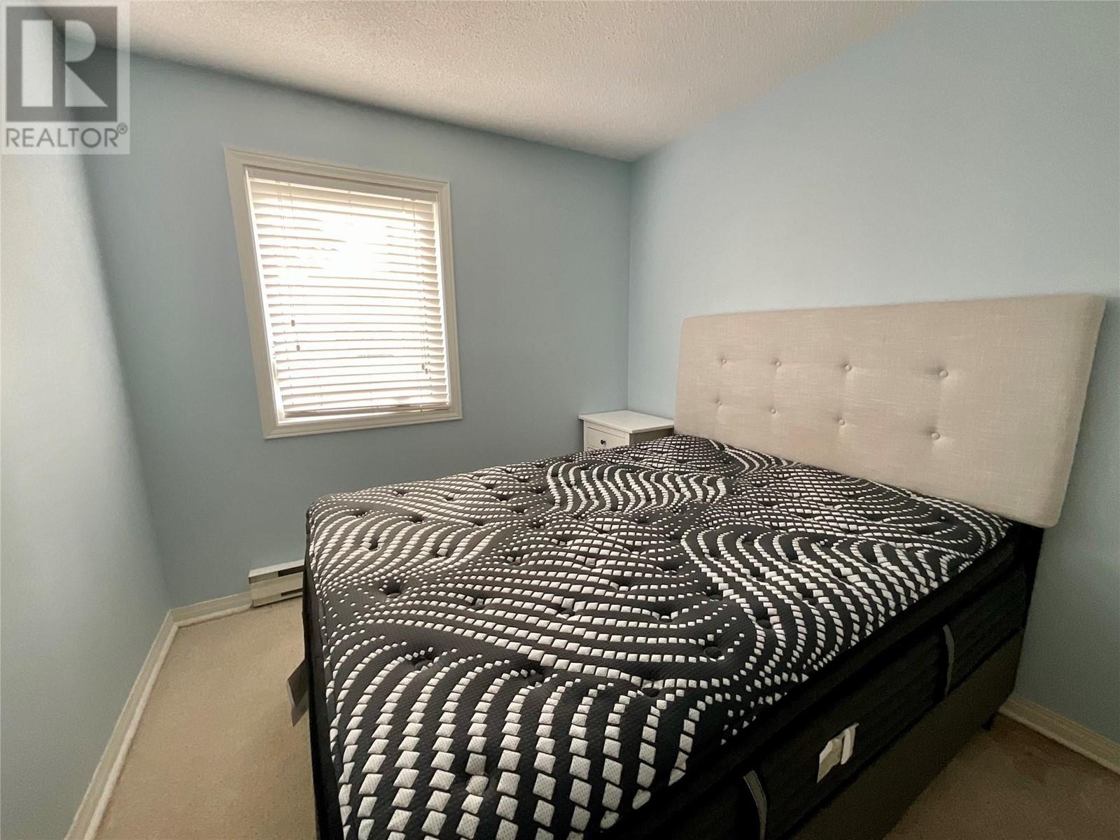 340 Northgate Unit# 214, Tumbler Ridge, BC - Indoor Photo Showing Bedroom