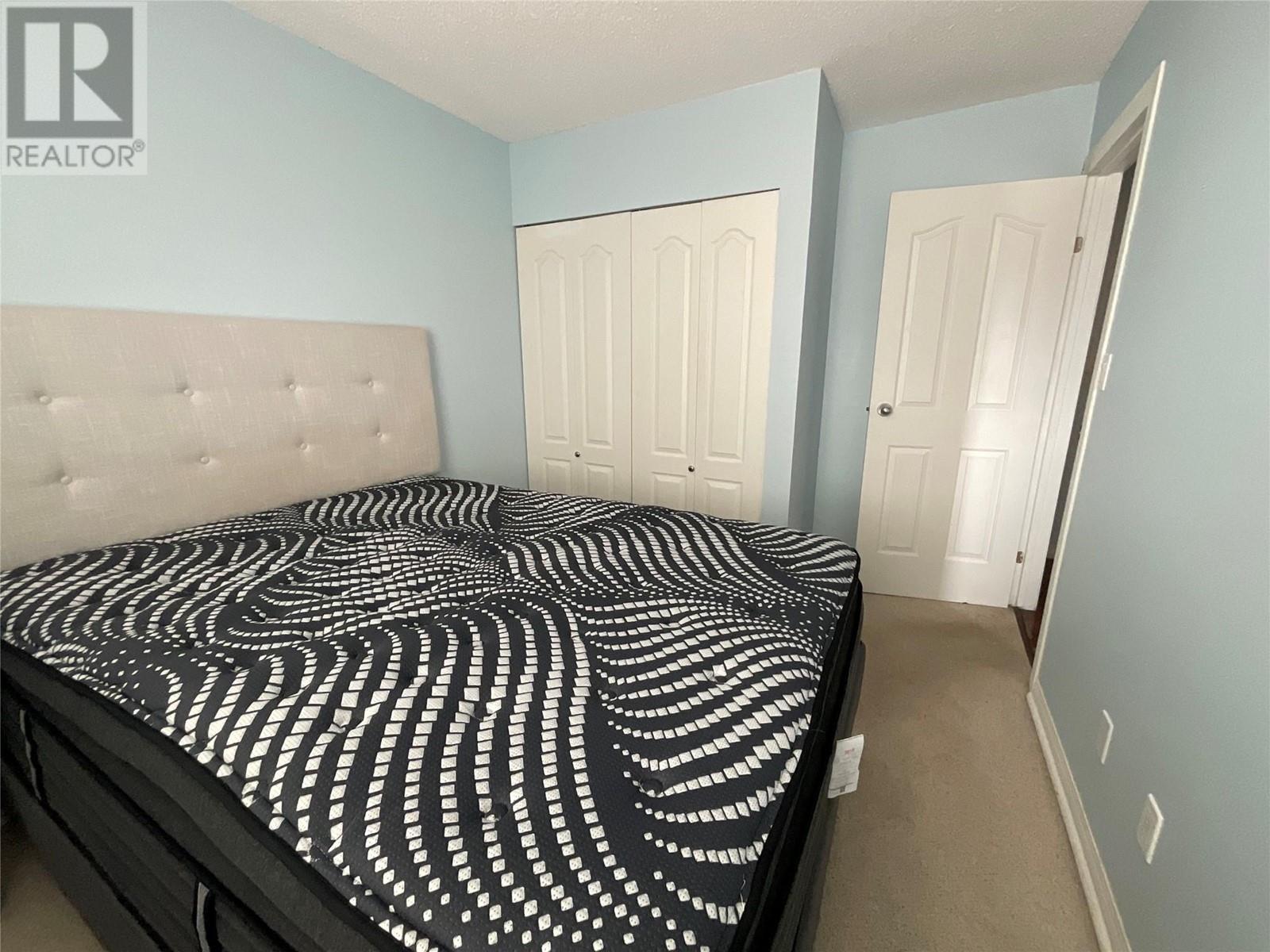 340 Northgate Unit# 214, Tumbler Ridge, BC - Indoor Photo Showing Bedroom