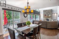 Open concept dining area with view of living room -