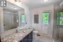 Full bathroom with glass shower -