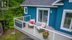 Seating area on deck upside of primary bedroom -