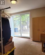 Main Floor primary with walkout to sundeck -