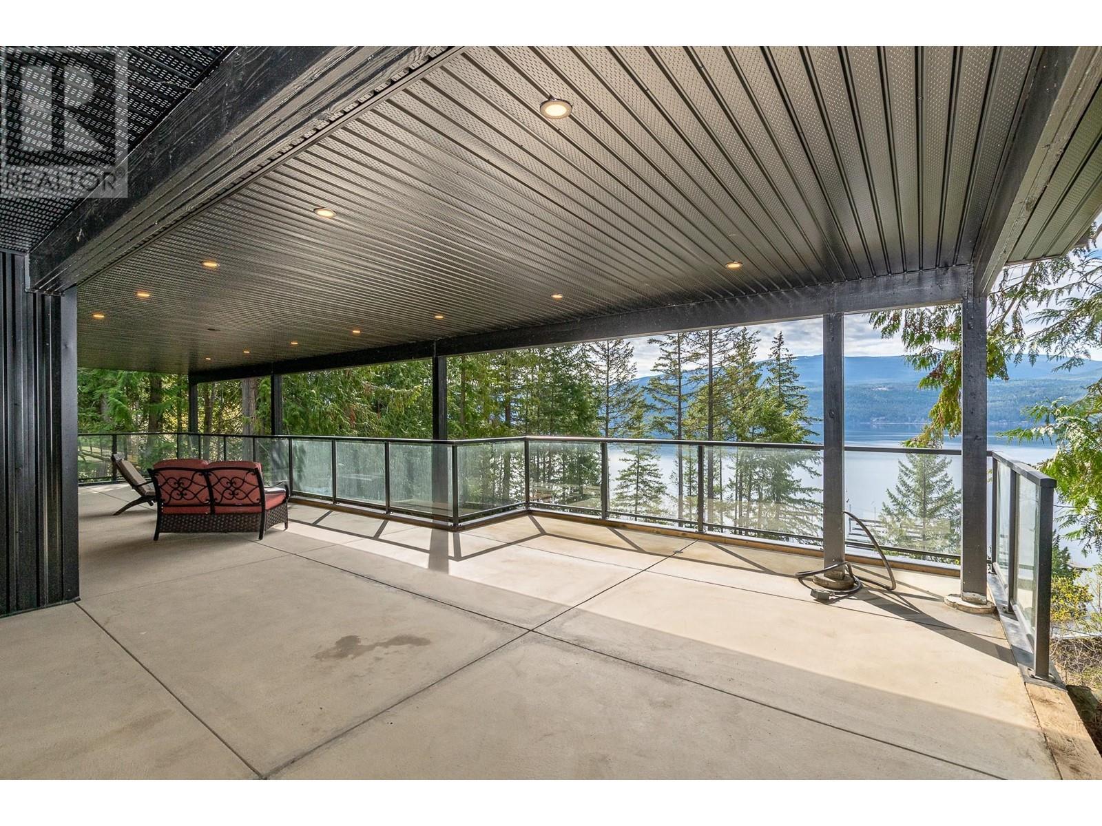 7750 Golf Course Road, Anglemont, BC - Outdoor With Deck Patio Veranda With Exterior