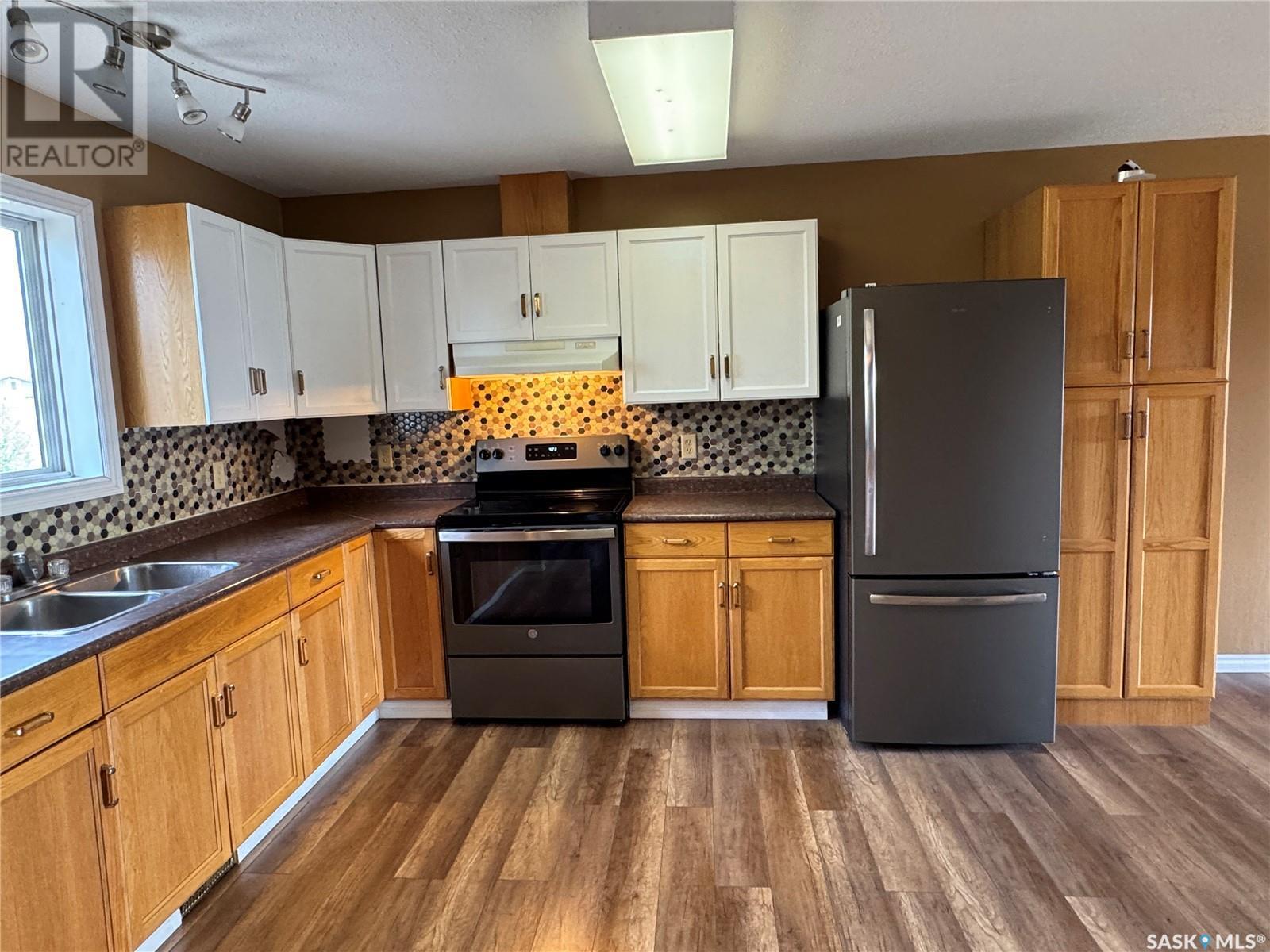 210 Bouvier Crescent, Beauval, SK - Indoor Photo Showing Kitchen With Stainless Steel Kitchen With Double Sink
