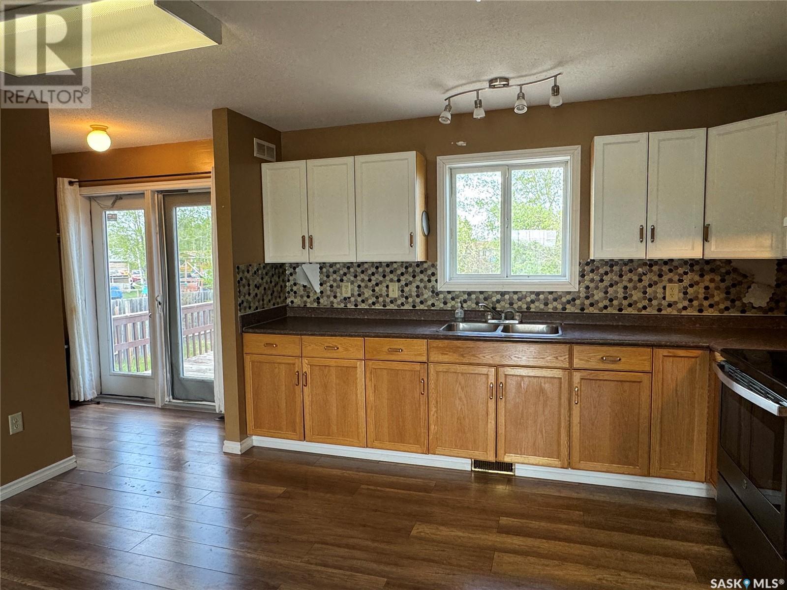 210 Bouvier Crescent, Beauval, SK - Indoor Photo Showing Kitchen With Double Sink