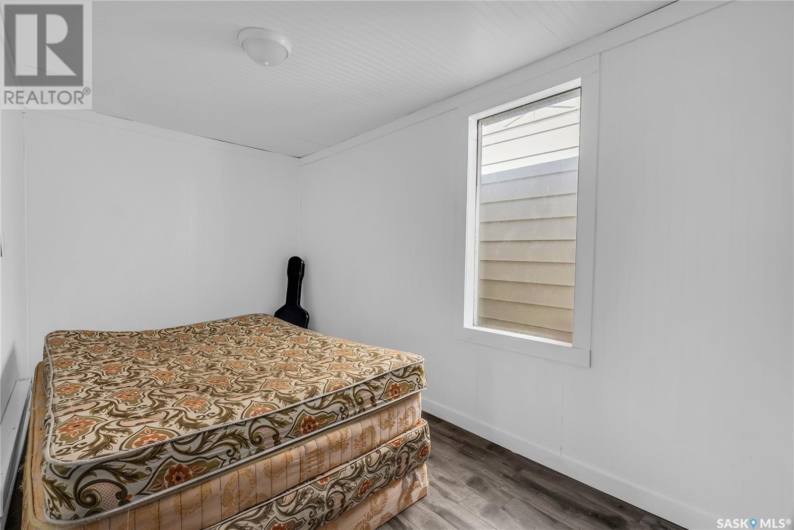 111 2Nd Avenue E, Biggar, SK - Indoor Photo Showing Bedroom