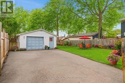 Garage and back yard - digitally enhanced -