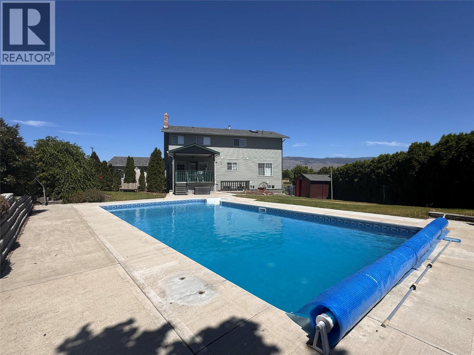 445 5 Road, Oliver, BC - Outdoor With In Ground Pool With Backyard