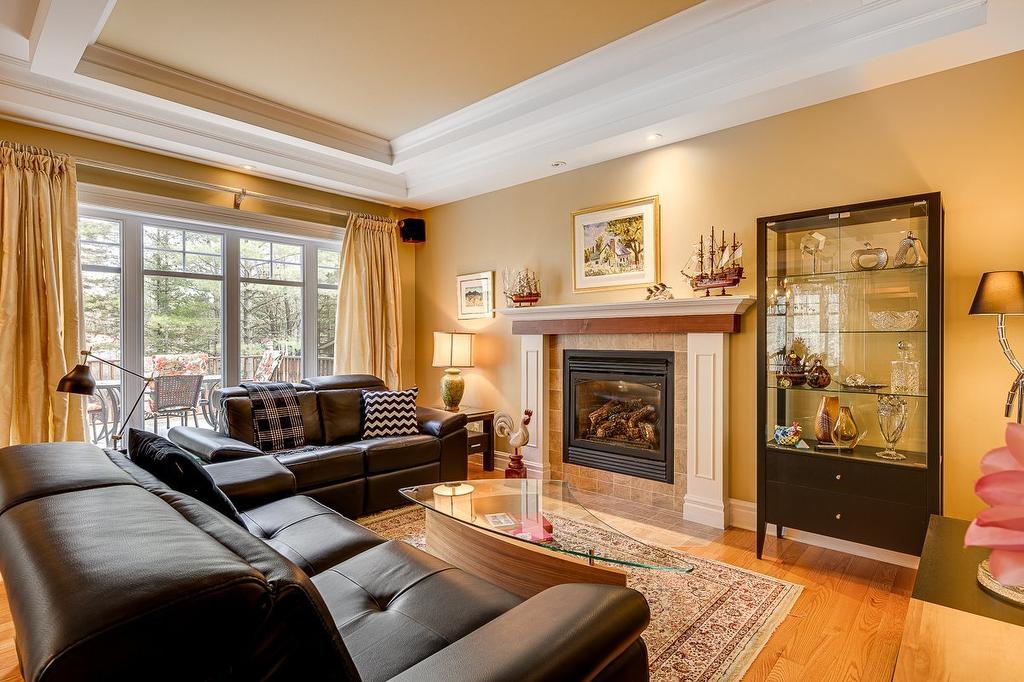 Living room - 500 Rue Des Rosiers, Sainte-Adèle, QC - Indoor Photo Showing Living Room With Fireplace
