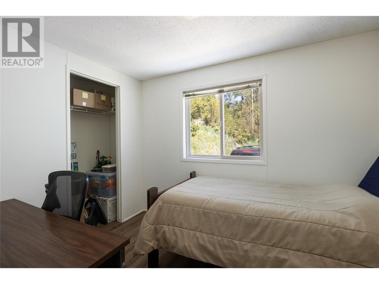 6740 Highway 97A Highway, Grindrod, BC - Indoor Photo Showing Bedroom
