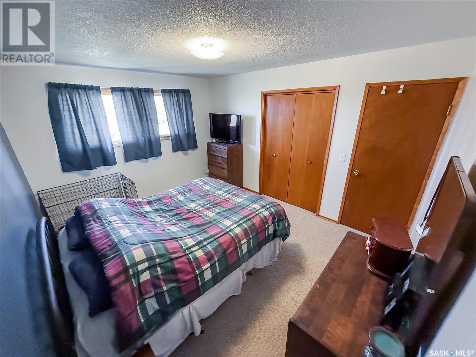 208 1St Street E, Climax, SK - Indoor Photo Showing Bedroom