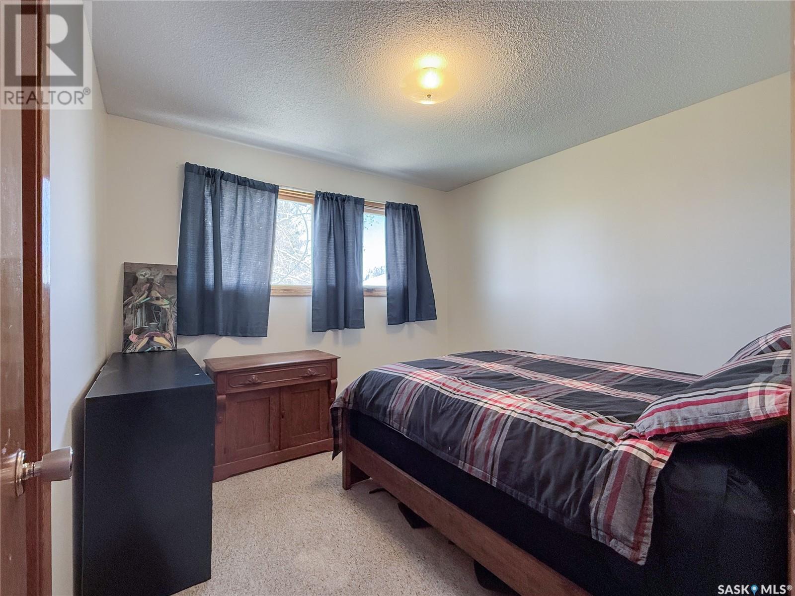 208 1St Street E, Climax, SK - Indoor Photo Showing Bedroom