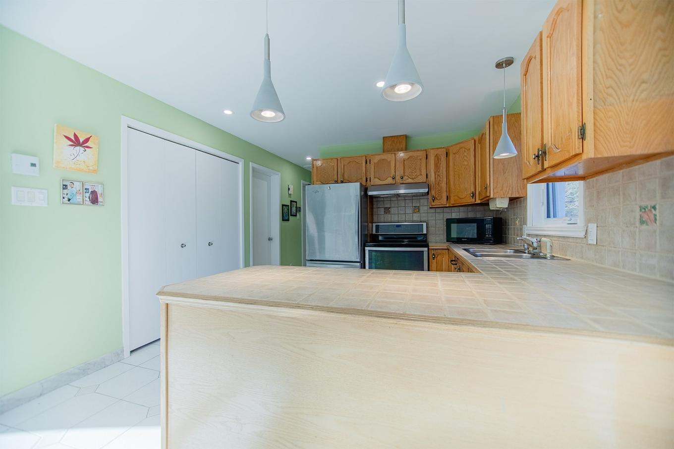 Cuisine - 700 Rue Des Pâquerettes, Chertsey, QC - Indoor Photo Showing Kitchen With Double Sink