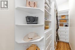 Primary bedroom's walk-in closet -