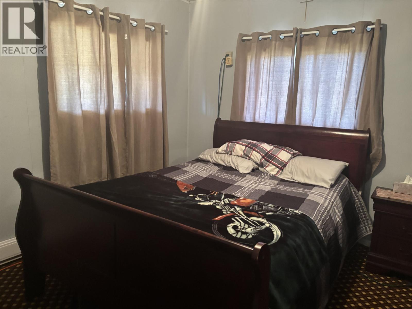 6162 Cedar Creek Road, Likely, BC - Indoor Photo Showing Bedroom