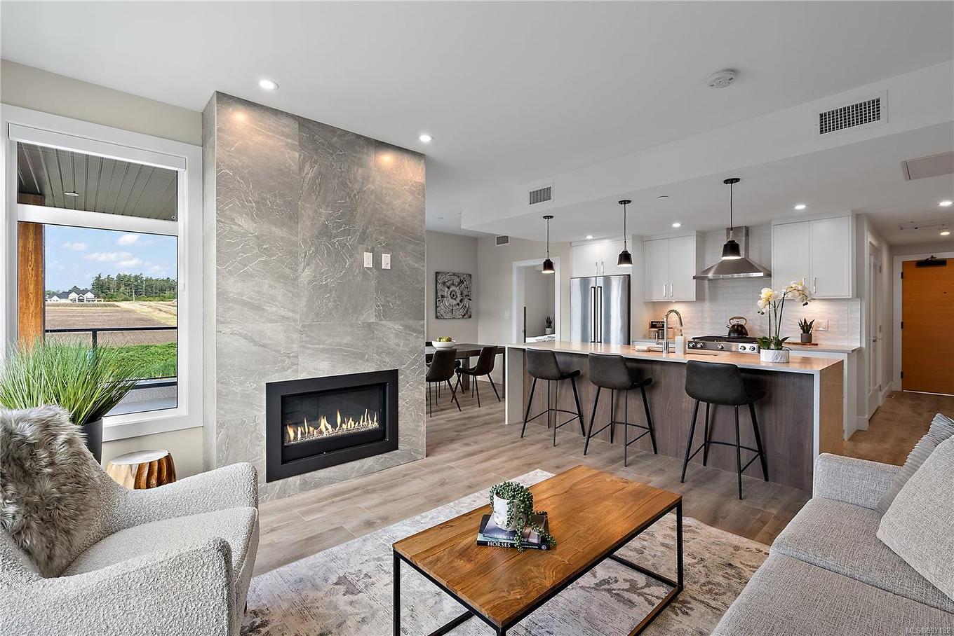 604-2520 Hackett Cres, Central Saanich, BC - Indoor Photo Showing Living Room With Fireplace
