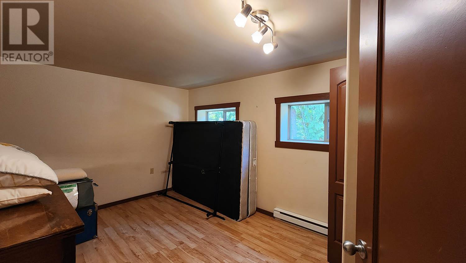 Manufactured Home bedroom 1 - 16424 Wadds Road, Crawford Bay, BC - Indoor Photo Showing Other Room