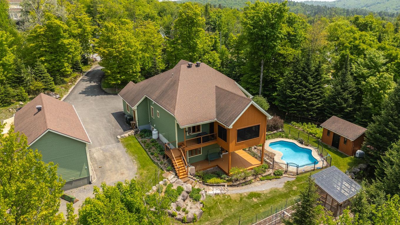 Aerial photo - 113 Mtée Des Samares, Sainte-Agathe-Des-Monts, QC - Outdoor With Above Ground Pool
