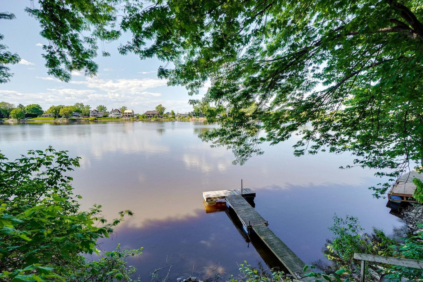 Waterfront - 11 Rue Île-Mathieu, Laval (Saint-François), QC - Outdoor With Body Of Water With View
