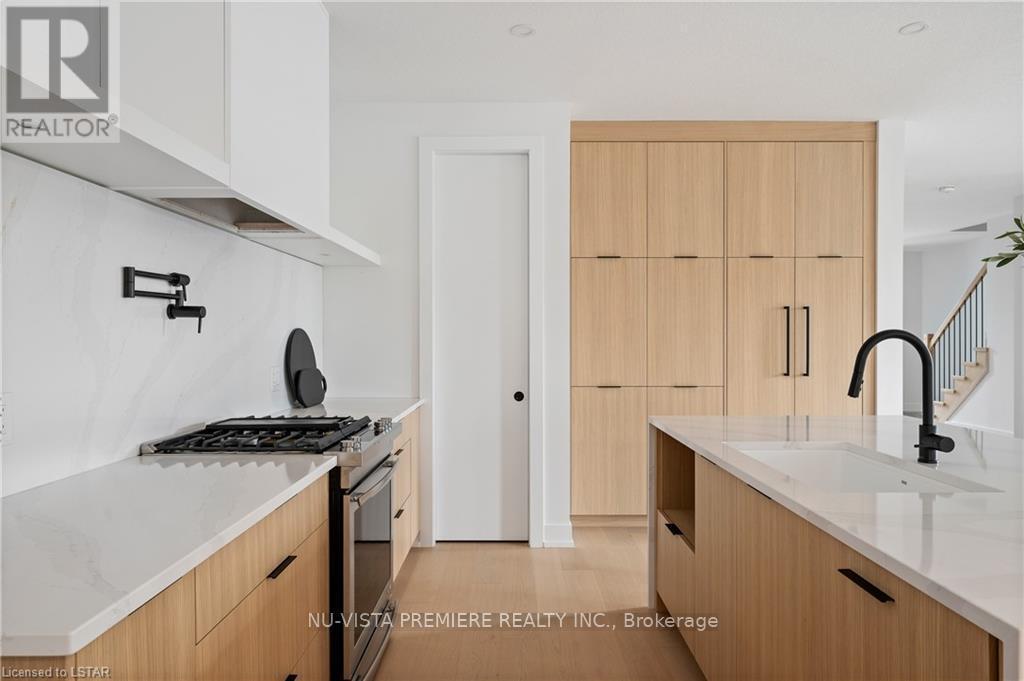 photos of another home to show LUX craftsmanship - 4383 Green Bend, London South (South V), ON - Indoor Photo Showing Kitchen With Upgraded Kitchen