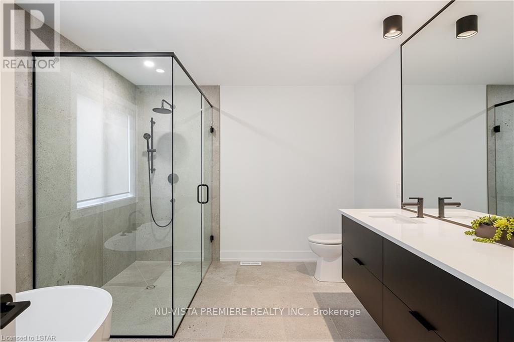 photos of another home to show LUX craftsmanship - 4383 Green Bend, London South (South V), ON - Indoor Photo Showing Bathroom