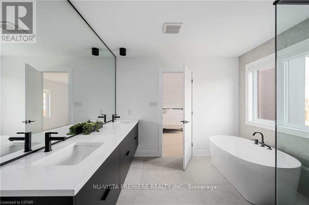 photos of another home to show LUX craftsmanship - 4383 Green Bend, London South (South V), ON - Indoor Photo Showing Bathroom