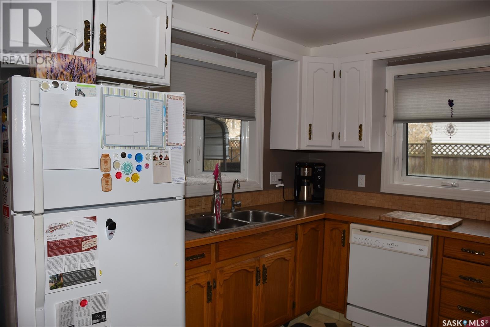 119 Dewdney Street, Indian Head, SK - Indoor Photo Showing Kitchen With Double Sink