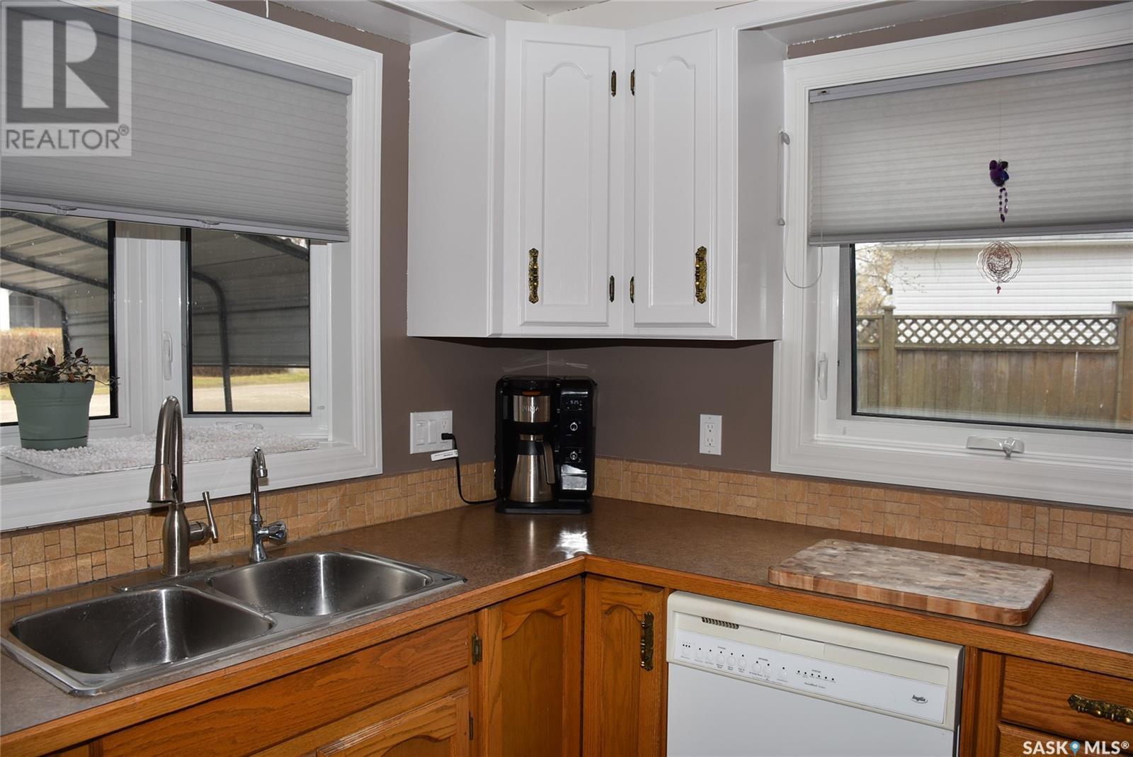 119 Dewdney Street, Indian Head, SK - Indoor Photo Showing Kitchen With Double Sink