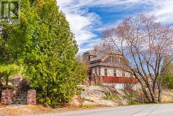 Stone stairs up to home from parking space -